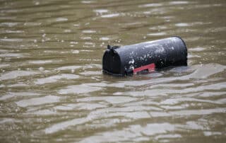 mailbox almost submerged by floodwater from Hurricane Harvey